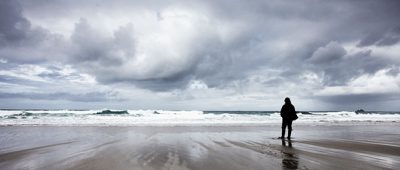 Stormy clouds over the ocean, from the beach.