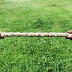 hands on rope in tug of war estate executor superannuation