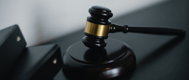 A Brisbane practitioner has faced court over multiple charges relating to misuse of client funds and unlicensed trading.